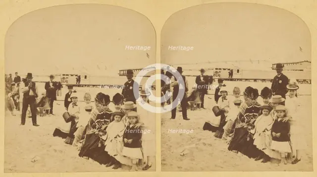 Family portrait at the beach, probably New York, about 1878. Creator: Halls.