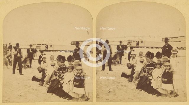 Family portrait at the beach, probably New York, about 1878. Creator: Halls.