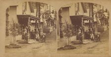 Family portrait posed on front porch of house, about 1865. Creator: Unknown