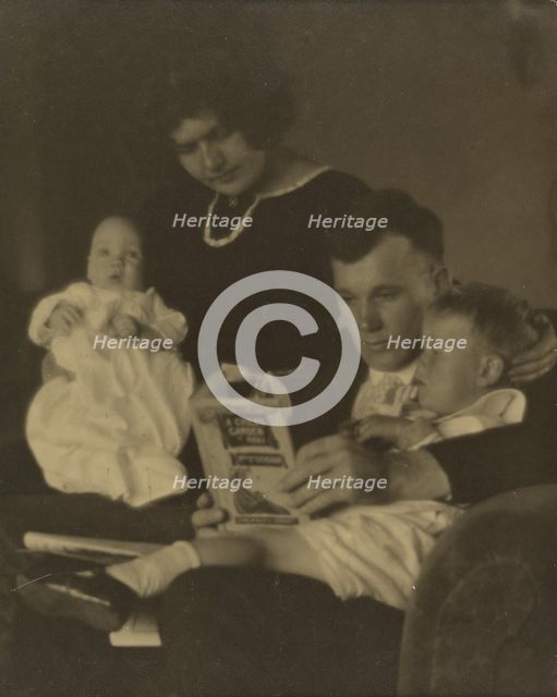 Family Portrait with A Child's Garden of Verses, about 1920. Creator: Louis Fleckenstein.