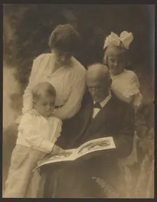 Family Portrait with Picture Book, 1907-1943. Creator: Louis Fleckenstein