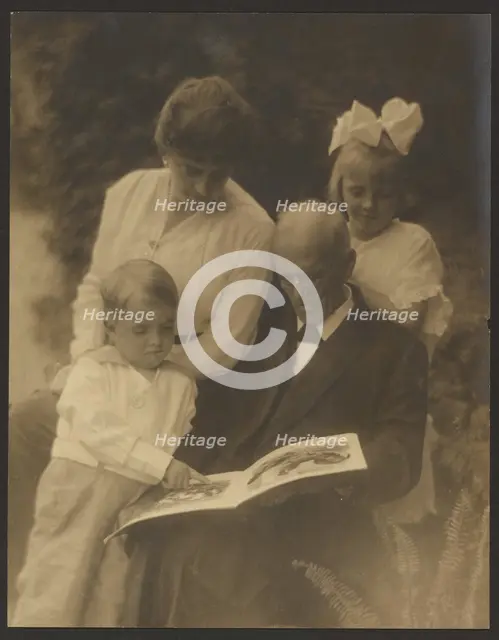 Family Portrait with Picture Book, 1907-1943. Creator: Louis Fleckenstein.