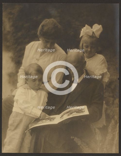 Family Portrait with Picture Book, 1907-1943. Creator: Louis Fleckenstein.