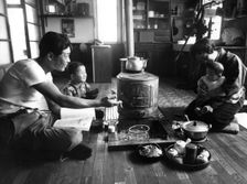 Family relaxing in their living-room, Hokkaido region, Japan, 1963