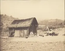 Family Seated by Thatched Hut, South America, 1850s. Creator: Unknown