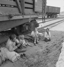 Family who traveled by freight train, Washington, Toppenish, Yakima Valley, 1939. Creator: Dorothea Lange