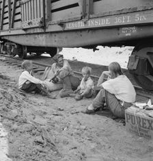 Family who traveled by freight train, Washington, Toppenish, Yakima Valley, 1939. Creator: Dorothea Lange