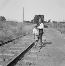 Family who traveled by freight train, Washington, Toppenish, Yakima Valley, 1939. Creator: Dorothea Lange