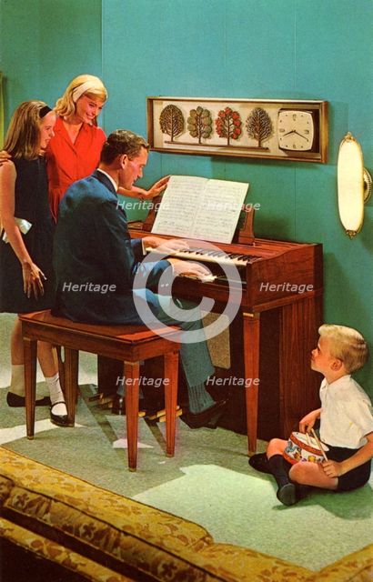 Family with a Wurlitzer 4040 organ, De Kalb, Illinois, USA, 1964. Artist: Unknown