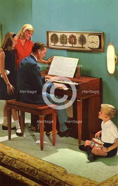 Family with a Wurlitzer 4040 organ, De Kalb, Illinois, USA, 1964. Artist: Unknown