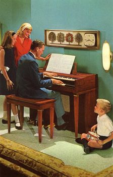 Family with a Wurlitzer 4040 organ, De Kalb, Illinois, USA, 1964