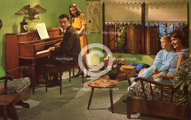 Family with a Wurlitzer model 2620 piano, USA, 1964. Artist: Unknown