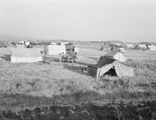 Families camped on flat before season opens waiting..., near Merrill, Klamath County, Oregon, 1939. Creator: Dorothea Lange