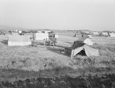 Families camped on flat before season opens waiting..., near Merrill, Klamath County, Oregon, 1939. Creator: Dorothea Lange