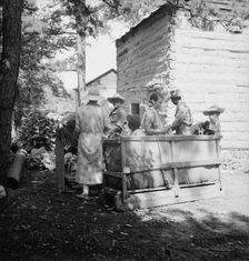 Families stringing tobacco brought in..., Granville County, North Carolina, 1939. Creator: Dorothea Lange