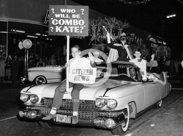 Fancy dress parade with a 1957 Cadillac, USA, (c1957?). Artist: Unknown