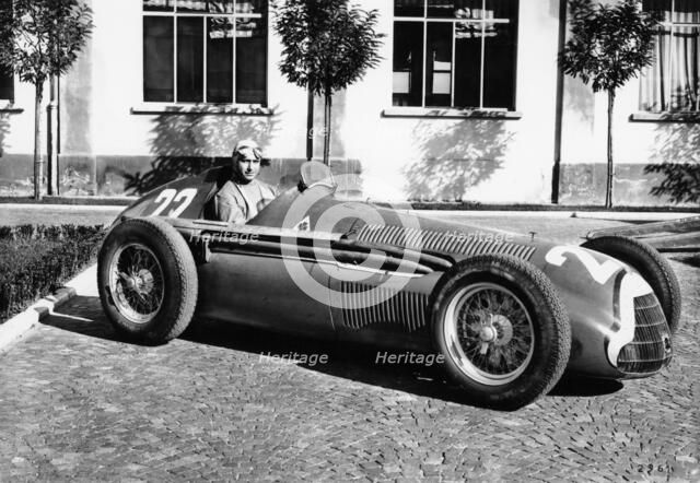Fangio in Alfa Romeo, prior to the San Remo Grand Prix, Italy, 1950. Artist: Unknown