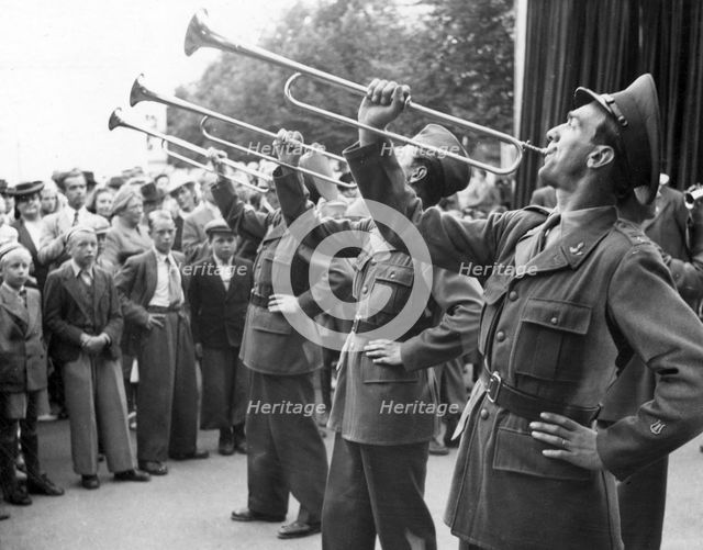 Fanfare by military trumpeters, celebration in the market place, Trelleborg, Sweden, 1946. Creator: Unknown.