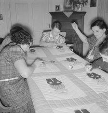 Farm women working on quilt, near West Carlton, Yamhill County, Oregon, 1939. Creator: Dorothea Lange