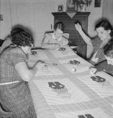 Farm women working on quilt, near West Carlton, Yamhill County, Oregon, 1939. Creator: Dorothea Lange