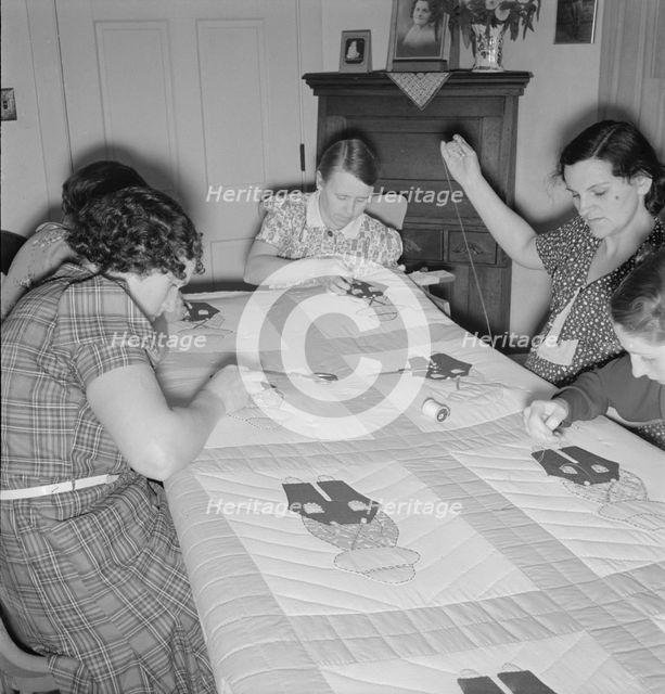 Farm women working on quilt, near West Carlton, Yamhill County, Oregon, 1939. Creator: Dorothea Lange.