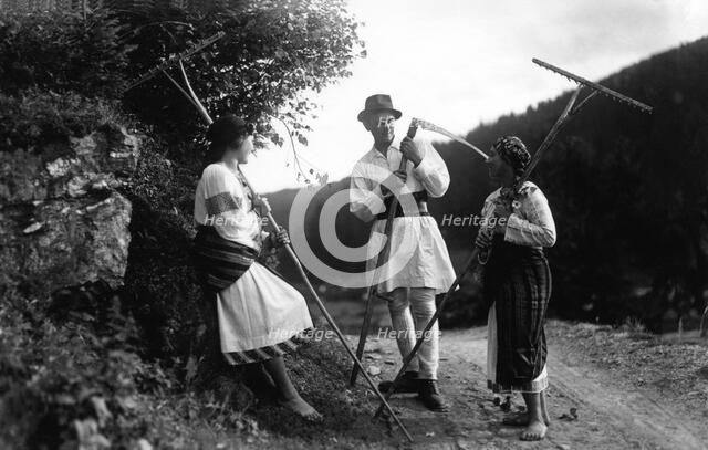 Farm workers with scythes and rakes, Bistrita Valley, Moldavia, north-east Romania, c1920-c1945. Artist: Adolph Chevalier