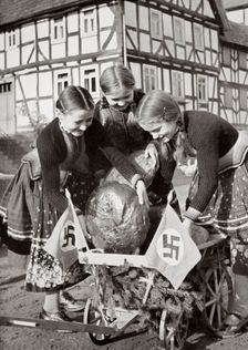 Farm bread being sent to the poor people in the city, Germany, 1936. Creator: Unknown