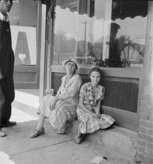 Farm folk spend a day in town, Eden, Alabama, 1936. Creator: Dorothea Lange