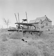 Farm machinery left on abandoned dry land farm in Columbia Basin, Grant County, Washington, 1939. Creator: Dorothea Lange