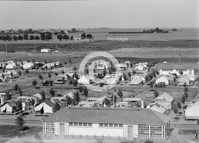 Farm Security Administration camp for migrant agricultural workers at Shafter, California, 1938. Creator: Dorothea Lange.