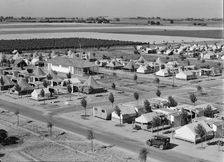 Farm Security Administration camp for migrant agricultural workers at Shafter, California, 1938. Creator: Dorothea Lange