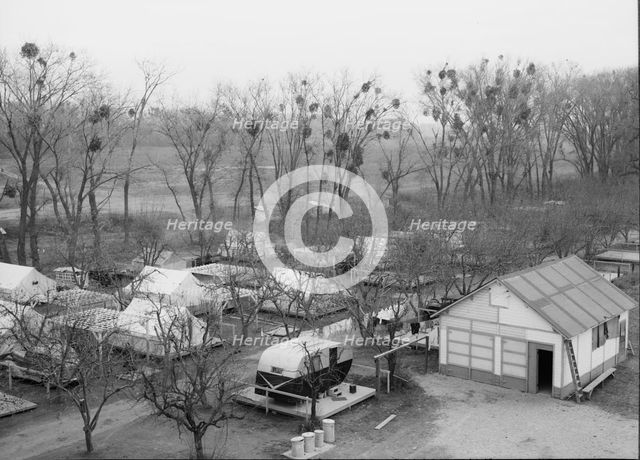 Farm Security Administration (FSA) temporary camp for migrants, Gridley, California, 1939. Creator: Dorothea Lange.