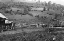 Farm Structures in the Ulus Kumys and a Ploughed Field on the Slope, 1913. Creator: GI Ivanov
