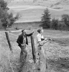 Farmer and boy in the fall of the year at the time the hunting..., Jackson County, Oregon, 1939. Creator: Dorothea Lange