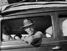 Farmer from Independence, Kansas, on the road at cotton chipping time, U.S. 99, California, 1939. Creator: Dorothea Lange