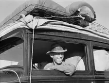 Farmer from Independence, Kansas, on the road at cotton chipping time, U.S. 99, California, 1939. Creator: Dorothea Lange