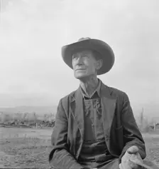 Farmer from Nebraska now developing eighty-acre stump farm, Bonner County, Idaho, 1939. Creator: Dorothea Lange