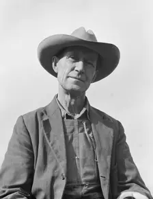 Farmer from Nebraska now developing eighty-acre stump farm, Bonner County, Idaho, 1939. Creator: Dorothea Lange