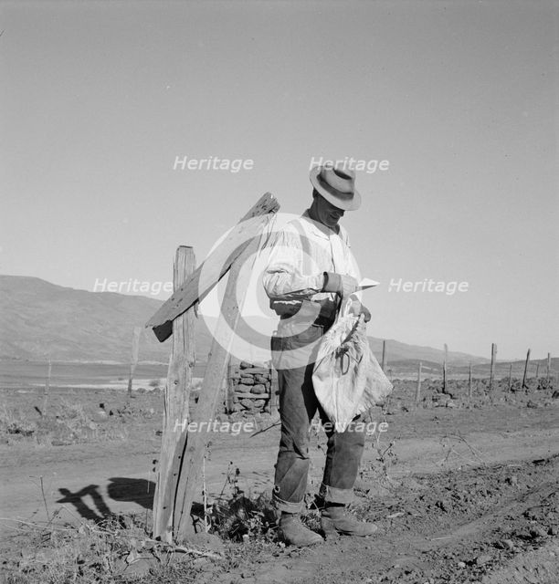Farmer getting the morning mail, Gem County, Idaho, 1939. Creator: Dorothea Lange.