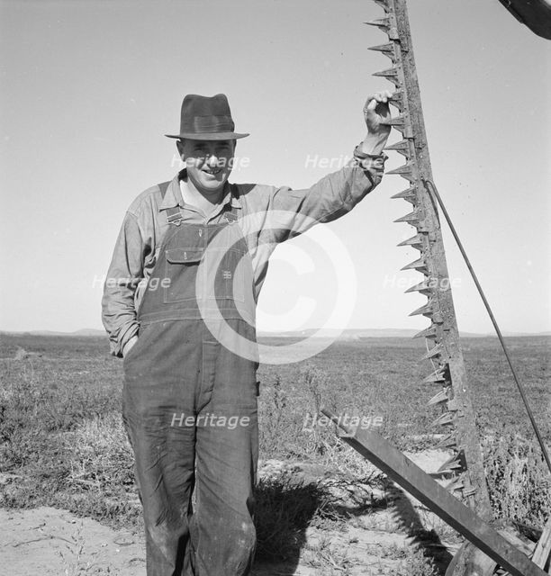 Farmer in his field getting ready to mow hay, Dead Ox Flat, Oregon, 1939. Creator: Dorothea Lange.
