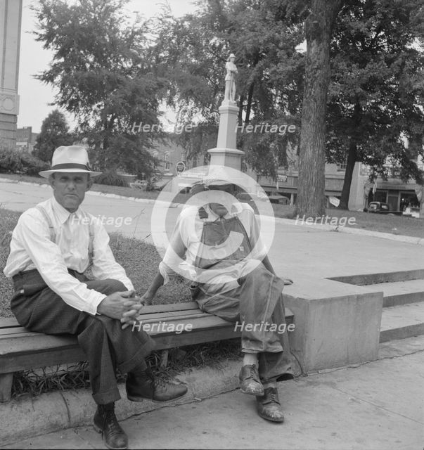 Farmer in town idling around the county courthouse, Person County, Roxboro, North Carolina, 1939. Creator: Dorothea Lange.