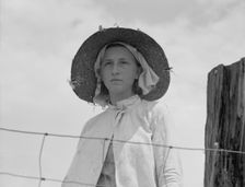 Farmer's daughter in the fields, farm in Georgia, 1937. Creator: Dorothea Lange