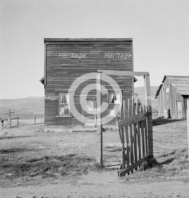 Farmer saloon and stagecoach tavern...the Ola self help sawmill co-op, Gem County, Idaho, 1939. Creator: Dorothea Lange.
