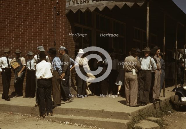 Farmers and townspeople in center of town on Court Day, Campton, Ky., 1940. Creator: Marion Post Wolcott.