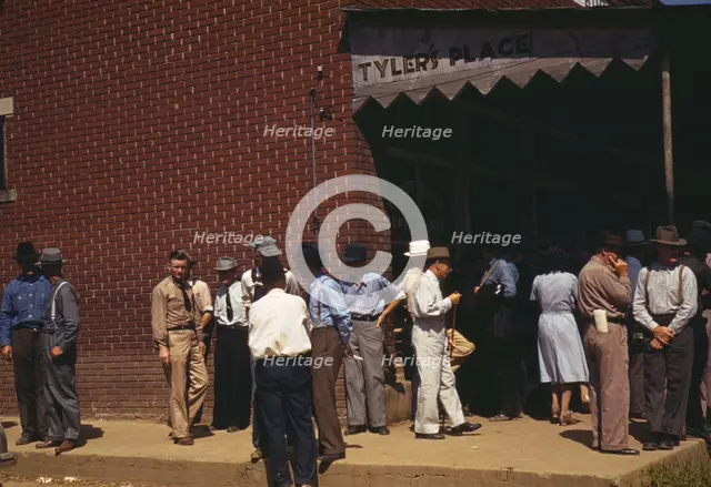 Farmers and townspeople in town on Court day, Campton, Ky., 1940. Creator: Marion Post Wolcott.