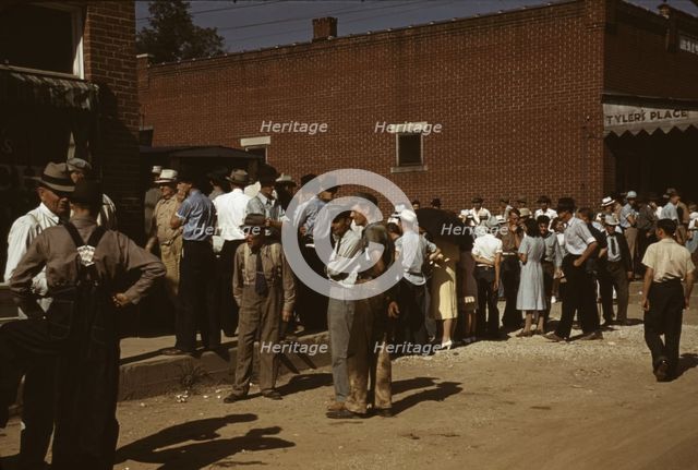 Farmers and townspeople in the center of town on Court Day, Campton, Ky., 1940. Creator: Marion Post Wolcott.