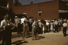 Farmers and townspeople in the center of town on Court Day, Campton, Ky., 1940. Creator: Marion Post Wolcott