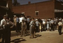 Farmers and townspeople in the center of town on Court Day, Campton, Ky., 1940. Creator: Marion Post Wolcott