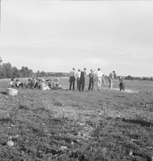 Farmers baseball game in the country, on U.S. 62, near Mountain Home, northern Arkansas, 1938. Creator: Dorothea Lange