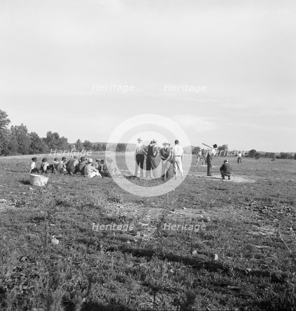 Farmers' baseball game in the country, on U.S. 62, near Mountain Home, northern Arkansas, 1938. Creator: Dorothea Lange.